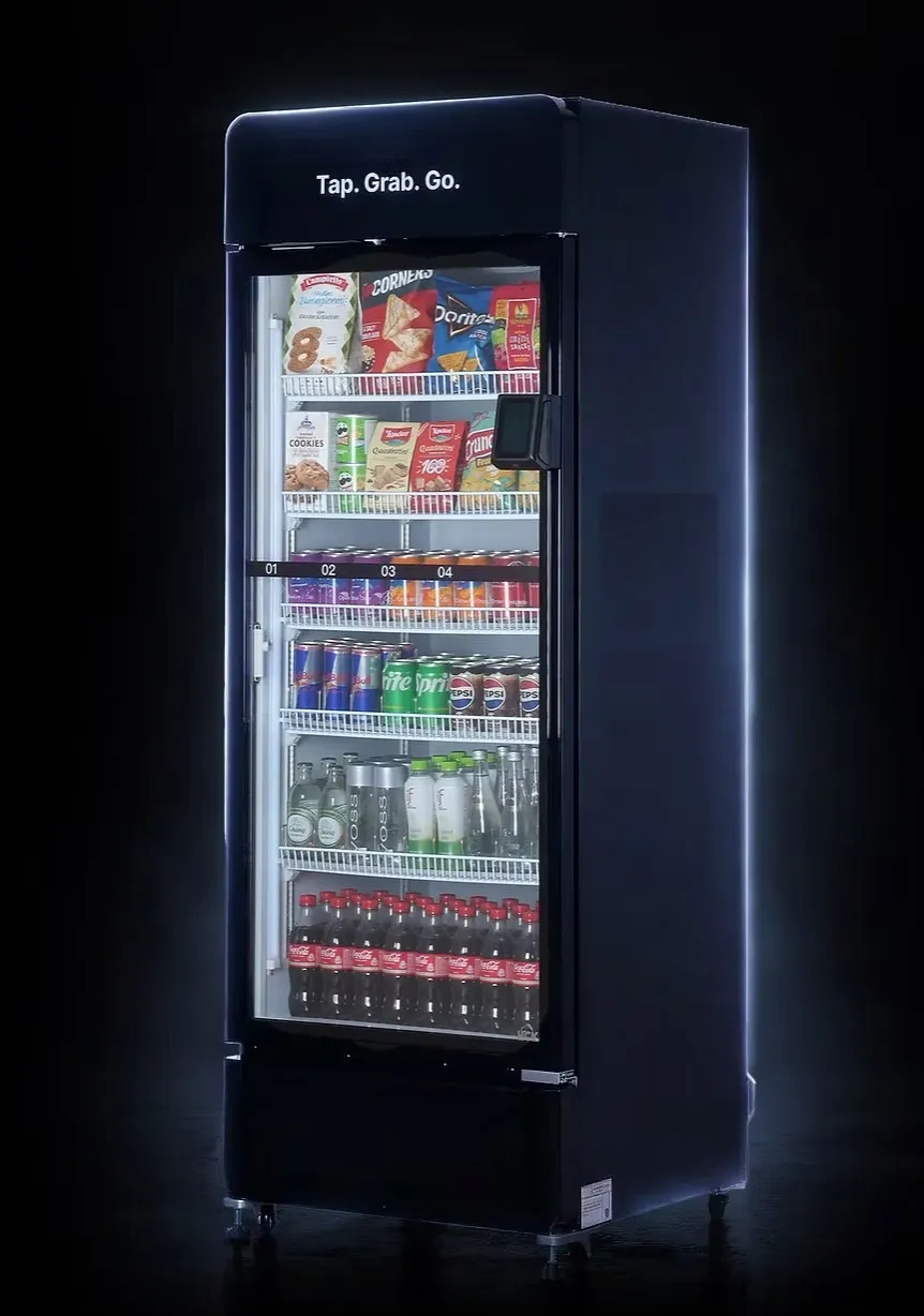Smart vending machine stocked with snacks and drinks, with a cashless self-service interface